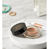 Rose gold cream highlighter lifestyle image.